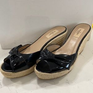 Valentino Garavani slip on platform slides with black patent leather bows